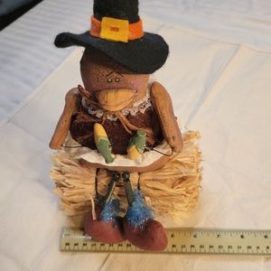 Thanksgiving Pilgrim Turkey Decoration Sitting on a Tiny Bale of Hay